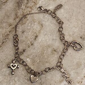 James Avery Charm Bracelet with 4 charms Including retired FAMILY charm
